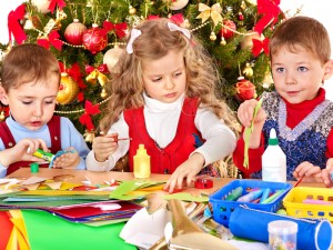 Kids making decoration for Christmas.